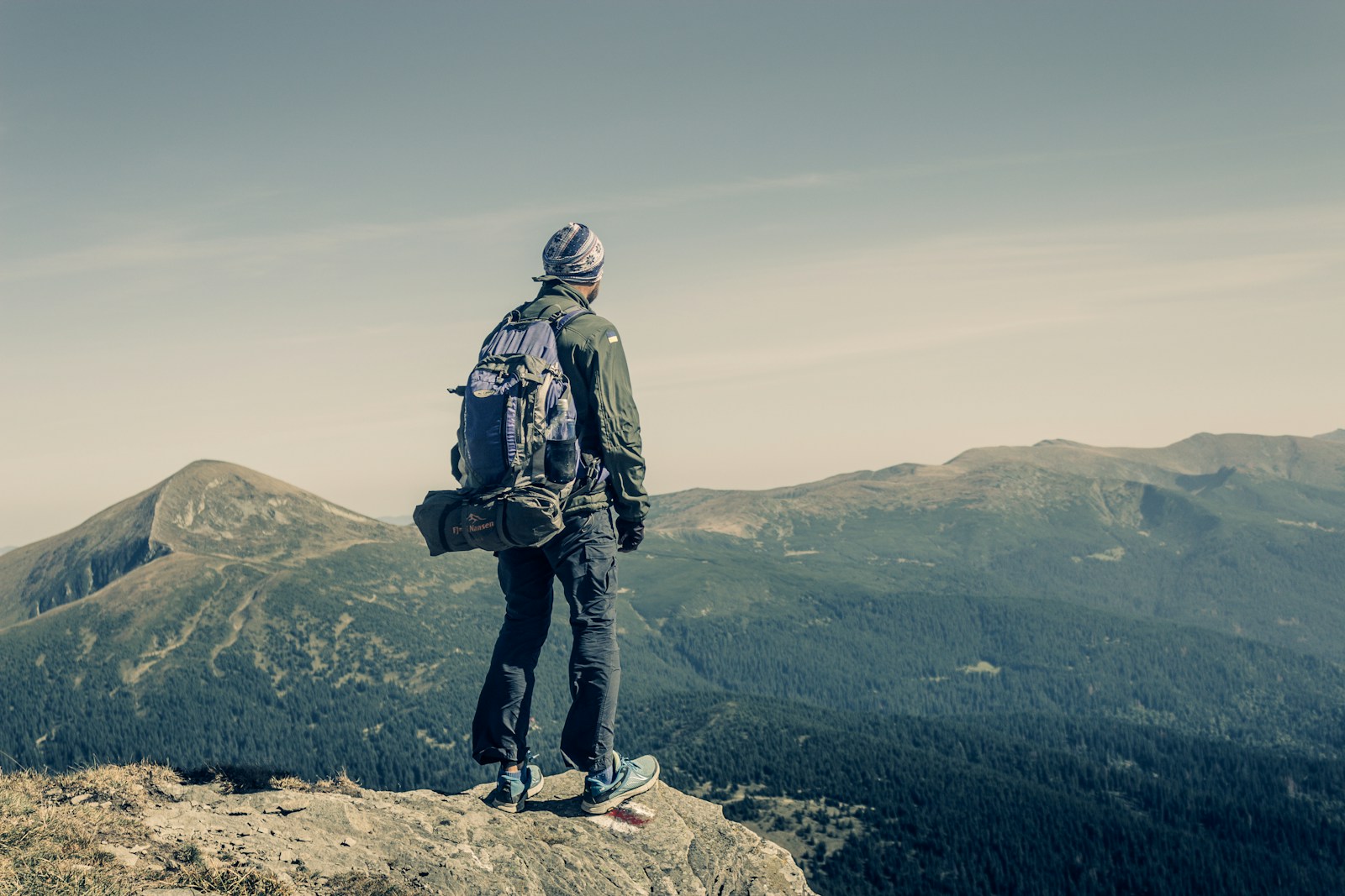 man standing near cliff